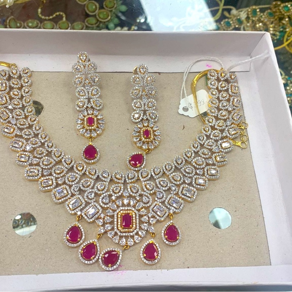 Silver and gold mix original ad necless and earing